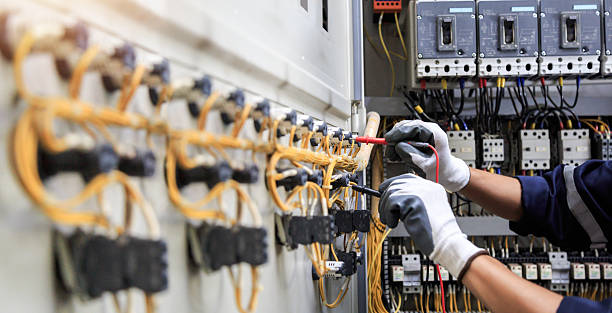 Professional Electrician technician working in Pine Lake Park, NJ